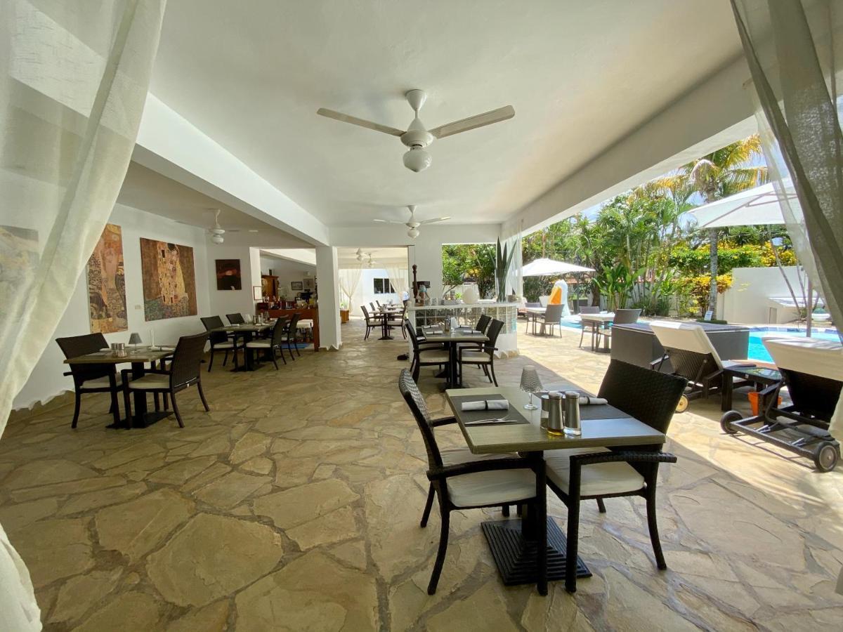 ホテル Casa Veintiuno Sosúa エクステリア 写真
