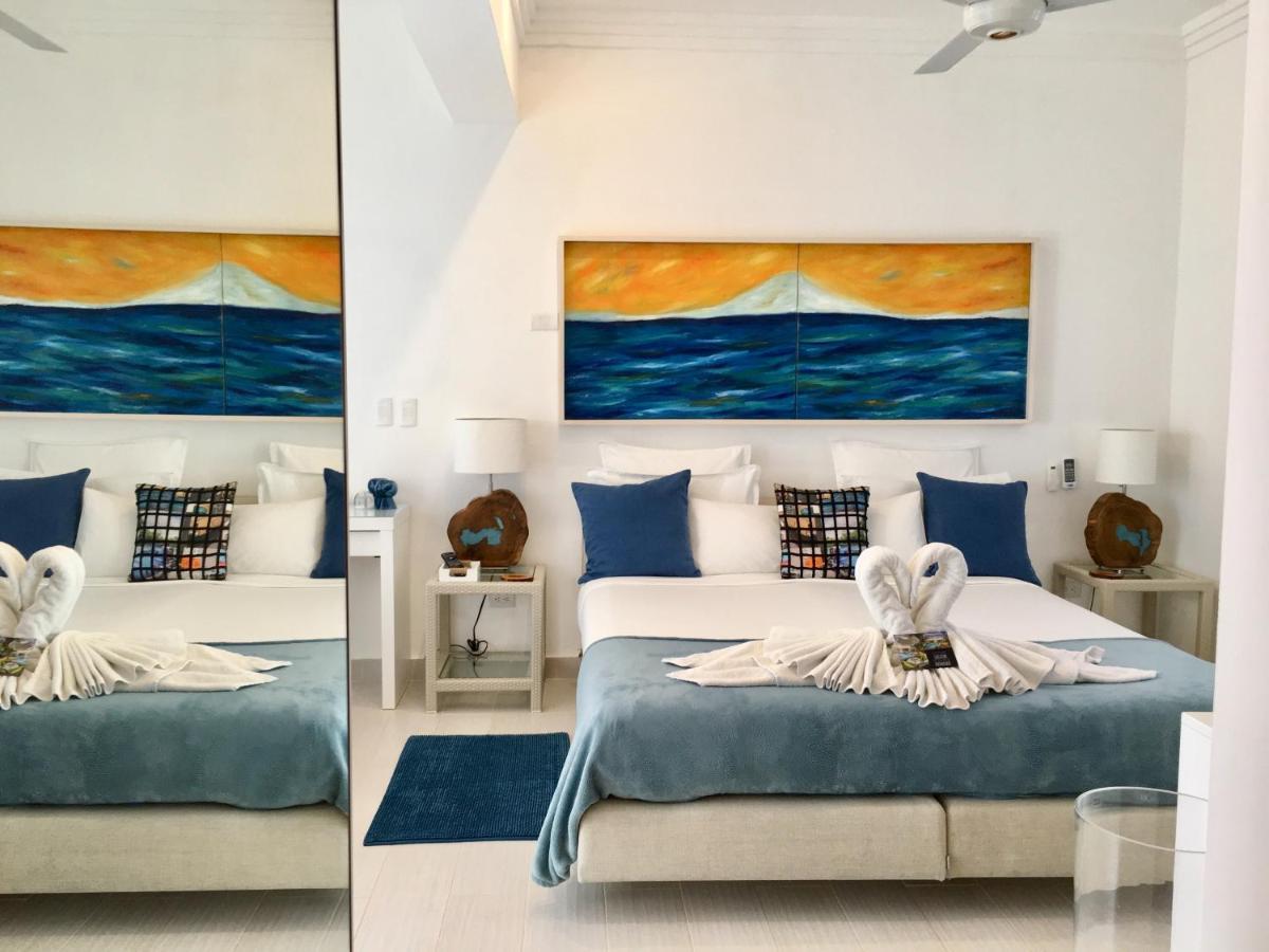 ホテル Casa Veintiuno Sosúa エクステリア 写真