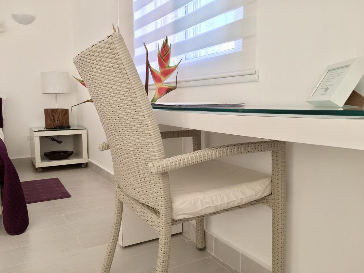 ホテル Casa Veintiuno Sosúa エクステリア 写真