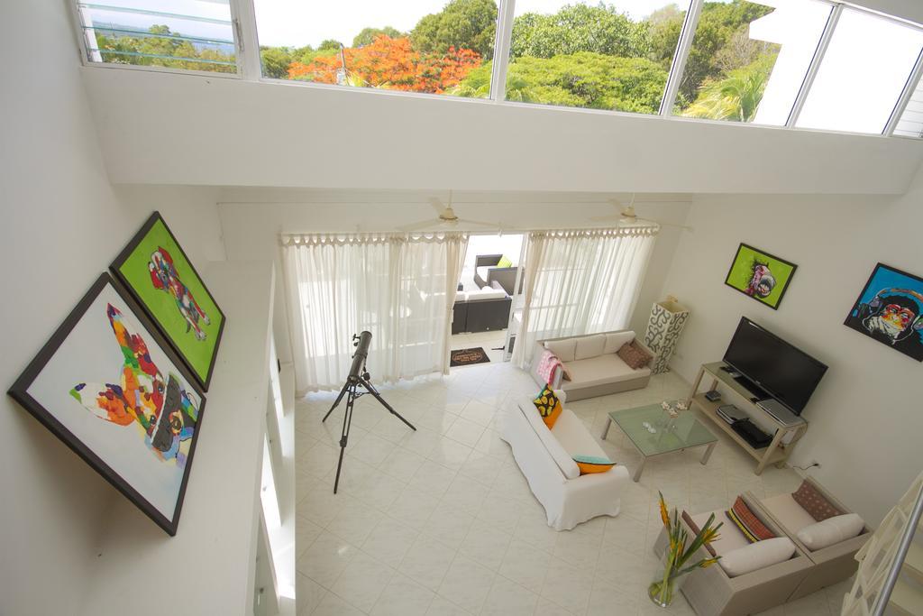 ホテル Casa Veintiuno Sosúa エクステリア 写真