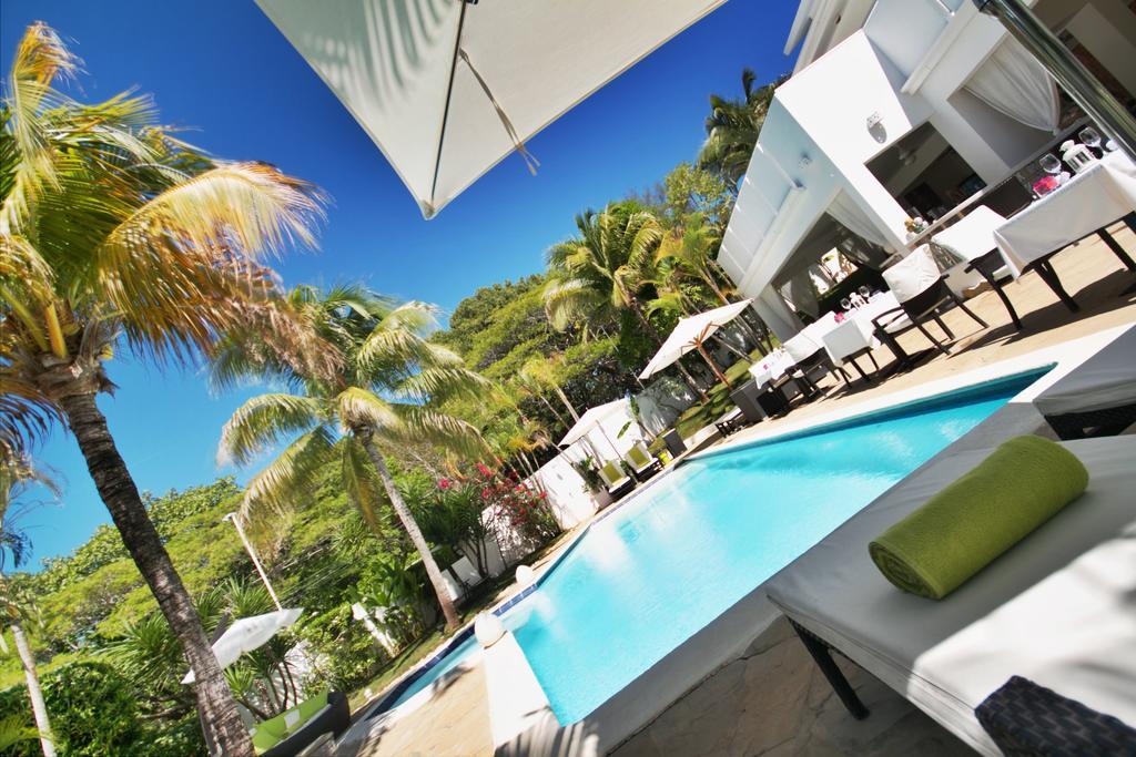 ホテル Casa Veintiuno Sosúa エクステリア 写真