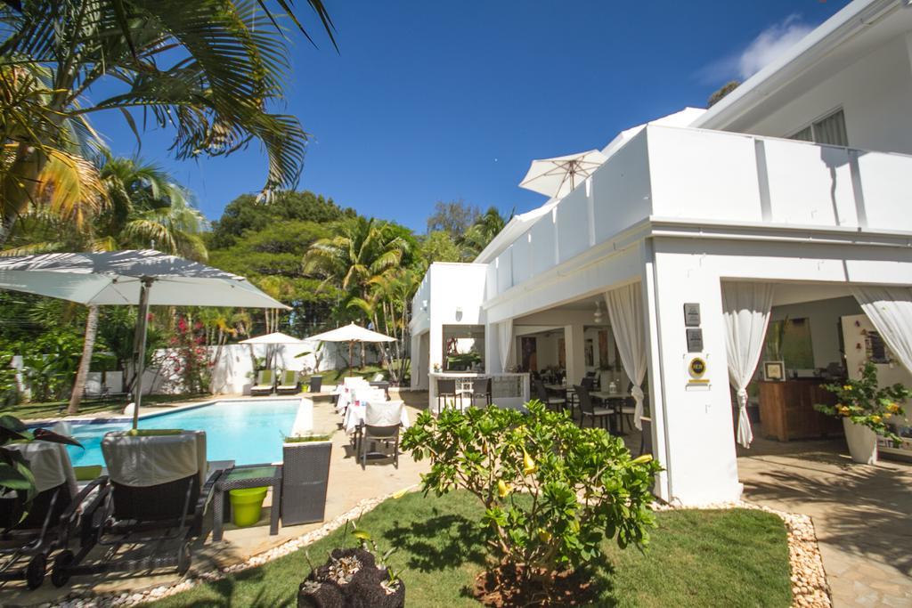 ホテル Casa Veintiuno Sosúa エクステリア 写真