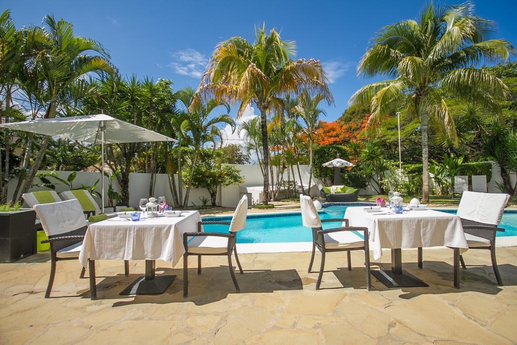 ホテル Casa Veintiuno Sosúa エクステリア 写真