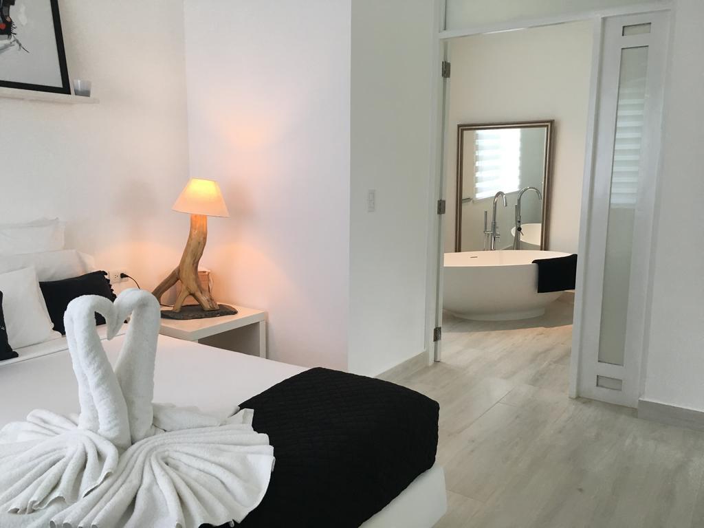 ホテル Casa Veintiuno Sosúa エクステリア 写真