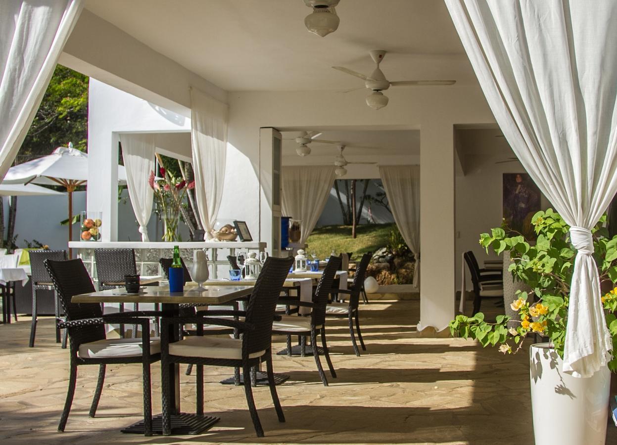 ホテル Casa Veintiuno Sosúa エクステリア 写真